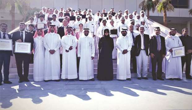 Participants in QUu2019s u201cQatar Scientists in Biological Diversityu201d programme pose for a picture.