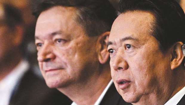 In this file photo taken on July 4 last year, Prokopchuk is seen with then-president Meng Hongwei at the opening of the Interpol World Congress in Singapore.