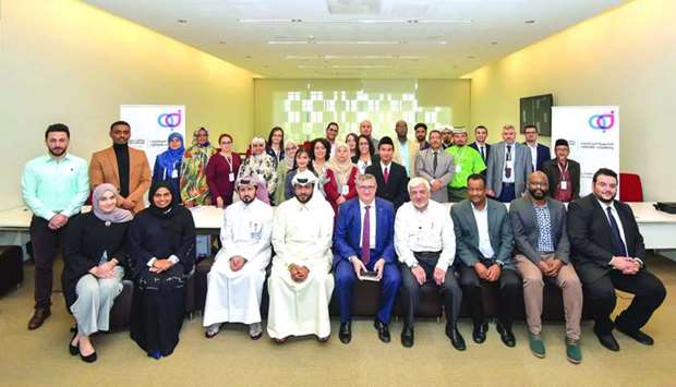 Fikret Ozer with QatarDebate officials and employees during his visit.