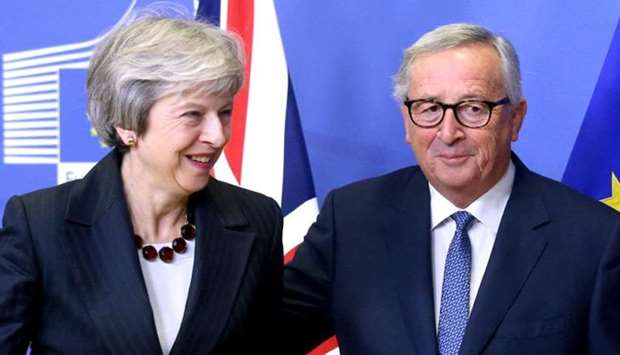 British Prime Minister Theresa May and European Commission President Jean-Claude Juncker (file photo)