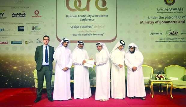 Milaha president and CEO Abdulrahman Essa al-Mannai receiving the award from HE Dr Mohamed bin Saleh al-Sada during the u20182nd Business Continuity and Resilience Conferenceu2019 held recently in Doha.