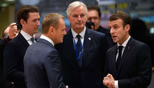 France's President Emmanuel Macron (R) chats with EU chief Brexit negotiator Michel Barnier (C), Austria's Chancellor Sebastian Kurtz (L) and European Council President Donald Tusk