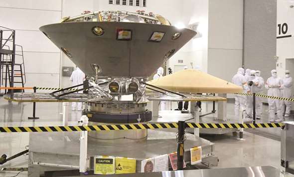 Nasau2019s InSight spacecraft, destined for the Elysium Planitia region in Marsu2019 northern hemisphere, undergoes final preparations at Vandenberg Air Force Base, California, in this April 6, 2018, file photo.