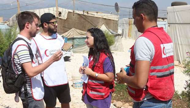 QRCS volunteers at a refugee camp in Joub Jannine
