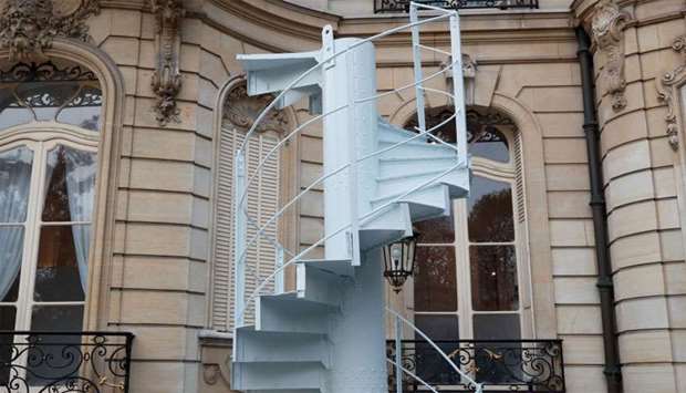 A portion of the original staircase of the Eiffel Tower constructed by Gustave Eiffel in 1889 is displayed during a press preview ahead of its upcoming auction organized by Artcurial in Paris