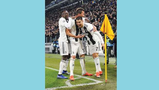 Juventusu2019 Mario Mandzukic celebrates with Cristiano Ronaldo and Blaise Matuidi after scoring against Valencia on Tuesday.