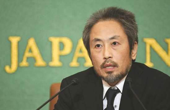 Japanese freelance journalist Jumpei Yasuda, who was freed from Syria in October 2018 after more than three years in captivity, speaks at a press conference at the Japan National Press Club in Tokyo yesterday.