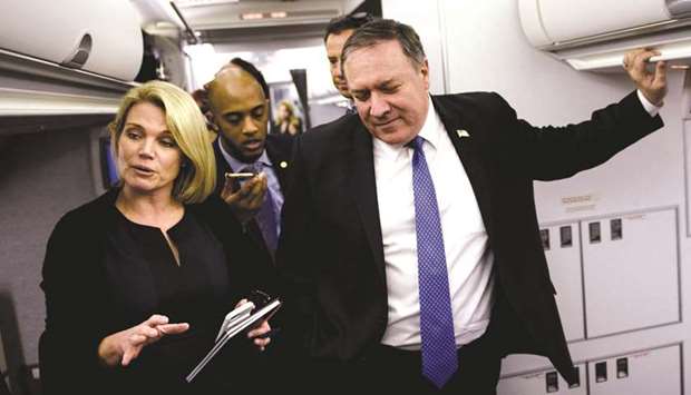 This picture taken on October 18 shows Nauert and US Secretary of State Mike Pompeo during a dialogue with reporters in his plane while flying from Panama to Mexico.