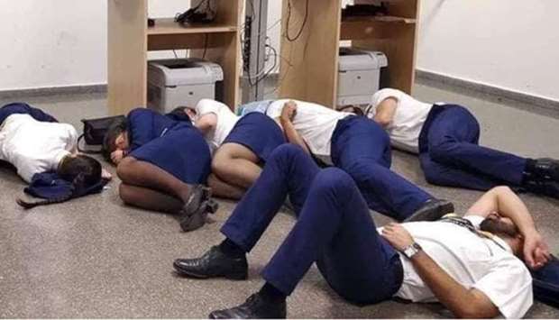 The airline said the group had staged ,a fake photograph to support a false claim - widely reported in international media outlets u2013 that they were 'forced to sleep on the floor' of the Malaga crew room.,
