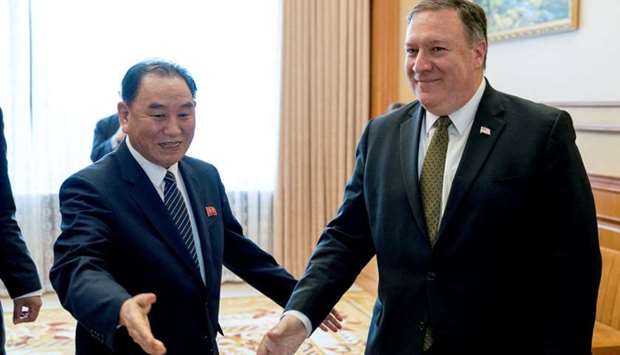 Secretary of State Mike Pompeo, right, and Kim Yong Chol, left, a North Korean senior ruling party official and former intelligence chief, arrive for a lunch at the Park Hwa Guest House in Pyongyang, North Korea. July 7, 2018 file photo.