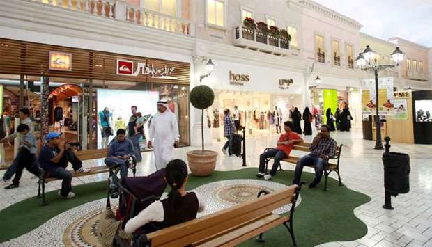 Visitors wait on benches outside retail stores at Villaggio Mall in Doha (file). More than 40% of organised retail accommodation is now provided in the three most prominent destination malls in Qatar u2014 Doha Festival City, The Mall of Qatar and Villaggio Mall.