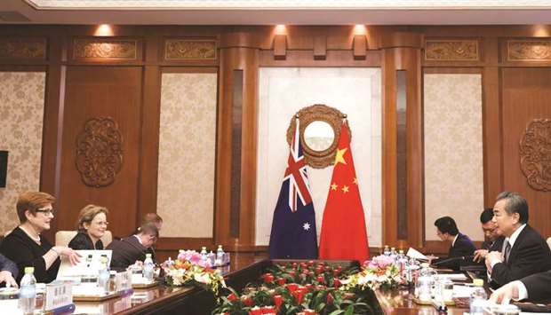 Australian Foreign Minister Marise Payne meets her Chinese counterpart Wang Yi at the Diaoyutai State Guesthouse in Beijing yesterday. Ties between Australia and China, its largest trading partner, have been strained since Australia accused China of meddling in its domestic affairs late last year.