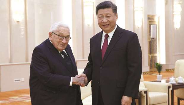 Chinese President Xi Jinping meets former US secretary of state Henry Kissinger at the Great Hall of the People in Beijing yesterday.  China wants to resolve problems with the US through talks but it must respect Chinau2019s choice of development path and interests, Xi said yesterday ahead of a meeting with the US leader in Argentina.