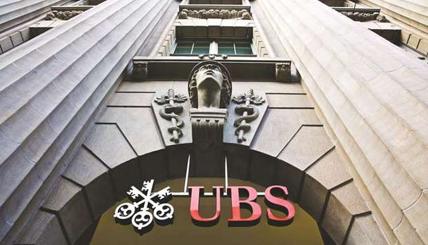 A sign hangs above the entrance to UBS headquarters in Zurich. UBS was accused of misleading investors about the quality of more than $41bn of subprime and other risky mortgage loans backing 40 securities offerings in 2006 and 2007, the US Department of Justice said in a complaint.