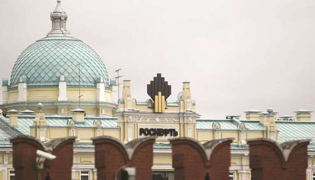 Rosneft headquarters is seen behind the Kremlin wall, in central Moscow. Russian energy majors are putting pressure on Western oil buyers to use euros instead of dollars for payments and introducing penalty clauses in contracts as Moscow seeks protection against possible new US sanctions.