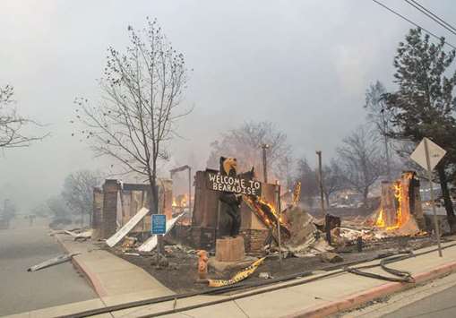 The Blackbear Diner burns as the Camp fire tears through Paradise, California. More than 18,000 acres have been scorched in a matter of hours burning with it a hospital, a gas station and dozens of homes.
