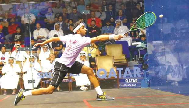 Abdulla al-Tamimi stretches to meet the ball during his second round match against Mathieu Castagnet.
