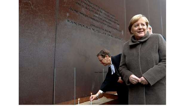 Merkel is seen during the ceremony marking the 30th anniversary of the fall of the Berlin Wall, at the Wall memorial on Bernauer Strasse in Berlin.