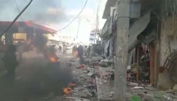Screenshot from a video posted on social media that purportedly shows fire and smoke emanating from the scene of explosion in Tel Abyad.