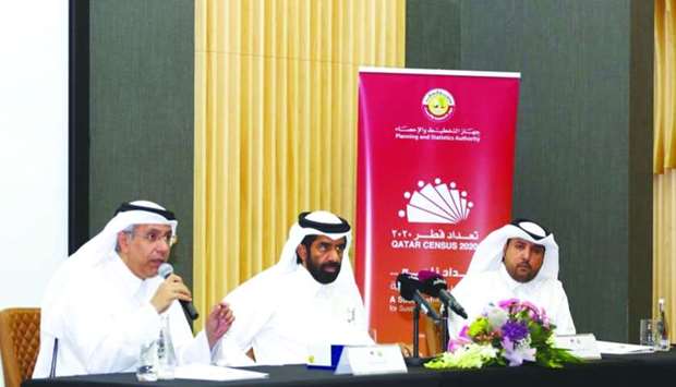 HE the President of Planning and Statistics Authority Dr Saleh bin Mohamed al-Nabit with Al-Mahdi (left) and Mubarak al-Nabit at the press conference on Sunday.