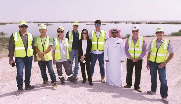 Dr Kuei-Chiu Chen with Ashghal employees and contractors who have helped create the lagoons.