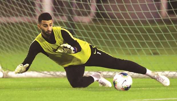 Qataru2019s goalkeeper Saad al-Sheeb trains at the Aspire Zone yesterday.