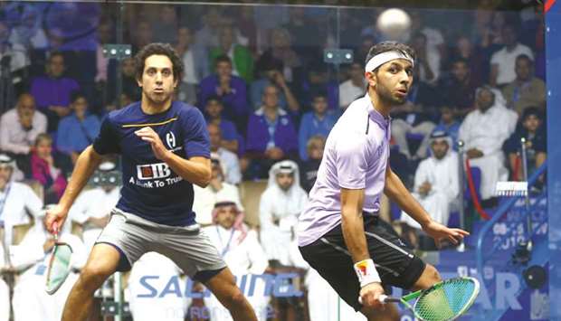 Abdulla al-Tamimi eyes a shot against Tarek Momen during their third round clash yesterday. PICTURE: Jayan Orma