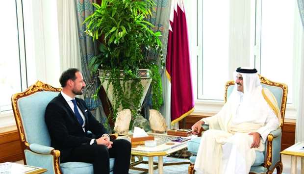 His Highness the Amir Sheikh Tamim bin Hamad al-Thani met Tuesday at the Amiri Diwan office with the Crown Prince of Norway Haakon Magnus and his accompanying delegation who are visiting the country to participate in the golden jubilee celebration of Qatar Fertiliser Company (Qafco) and the 50th anniversary of its co-operation with Norwegian Yara International ASA company. During the meeting, they reviewed Qatar-Norway relations in various fields, ways to enhance them and issues of mutual interest.