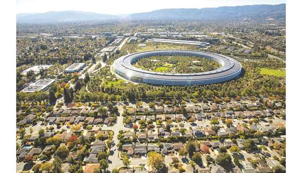 The Apple Park campus stands in this aerial photograph taken above Cupertino, California. During a conference call with analysts, Apple CEO Tim Cook and CFO Luca Maestri described a potential solution to iPhone upgrade problem: A new feature for the Apple Card that lets users pay for their iPhones over 24 months with no interest and manage that payoff programme directly from their iPhone.