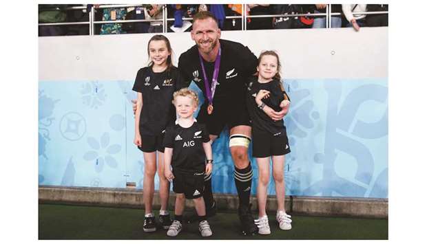 New Zealandu2019s Kieran Read poses with his children after the match against Wales yesterday.