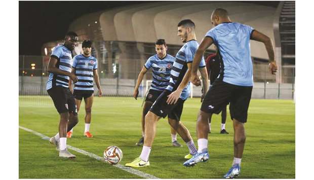 Al Duhail players train on the eve of their QNB Stars League match against Al Sadd at the Abdullah bin Khalifa stadium.