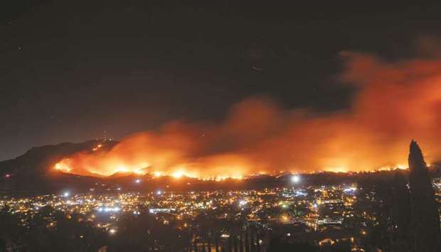 This long-exposure photo shows the Maria fire as it races across a hillside in Santa Paula, California.