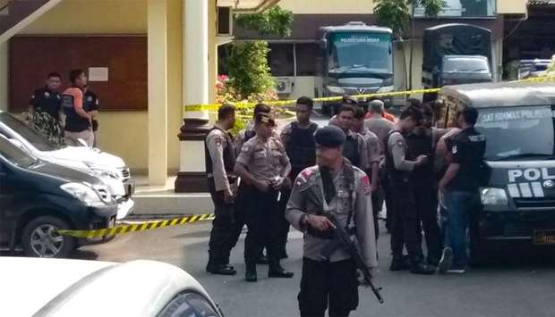 Indonesian police secure their headquarters in Medan, North Sumatra