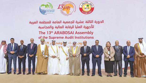 HE the Prime Minister and Minister of Interior Sheikh Abdullah bin Nasser bin Khalifa al-Thani with other dignitaries at the 13th session of the General Assembly of the Arab Organisation of Supreme Audit Institutions (Arabosai) at the Doha Sheraton Hotel yesterday.