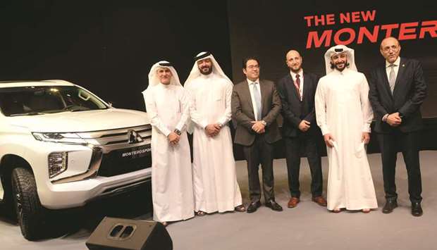 Sheikh Nasser bin Nawaf al-Thani, Sheikh Faleh bin Nawaf al-Thani, other dignitaries and NBK Auto officials at the event.