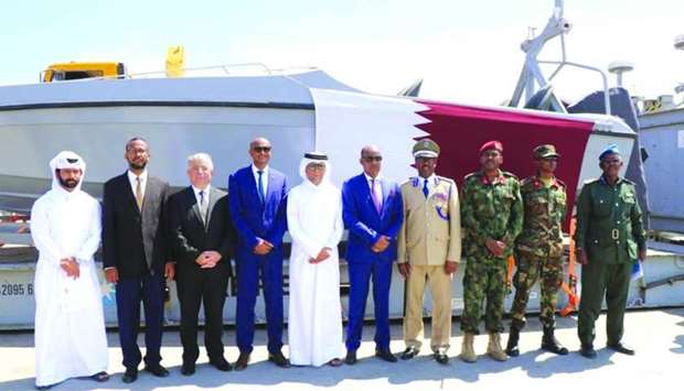 Somali and Qatari officials on the occasion of handing over of Qatari donation - boats and machinery - in Mogadishu.