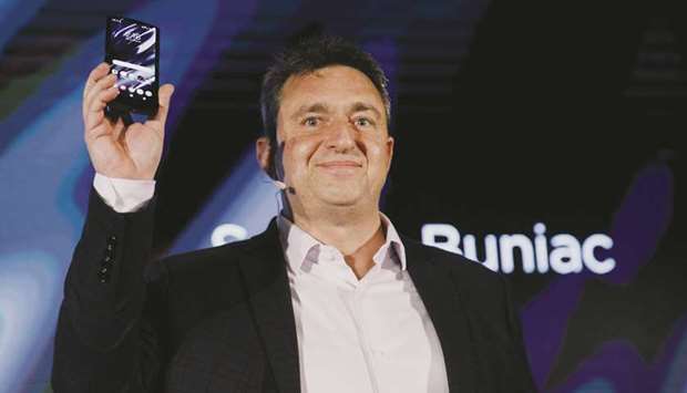 Sergio Buniac, president of Motorola Mobility Holdings Inc and senior vice president of Lenovo Group Ltd, unveils the Motorola Razr smartphone during an event in Los Angeles on Wednesday.
