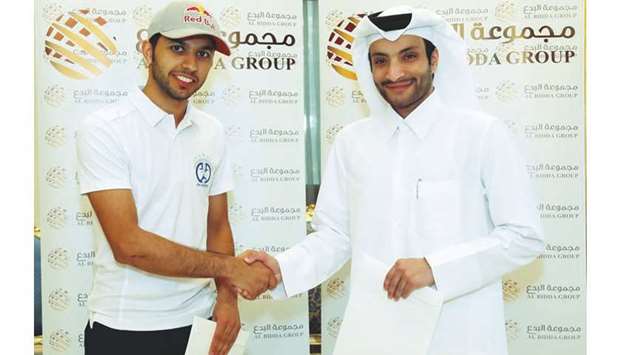 Al Bidda Group Chairman Sheikh Suhaim bin Abdul Aziz al-Thani (right) with Abdulla  Mohamed al-Tamimi after signing a two-year sponsorship agreement yesterday.