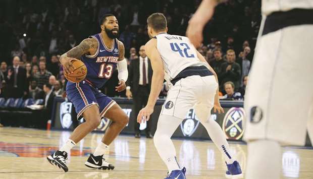 New York Knicks small forward Marcus Morris Sr. (left) controls the ball against Dallas Mavericks center Maxi Kleber (42) during the NBA game at Madison Square Garden in New York City, United States, on Thursday. (USA TODAY Sports)