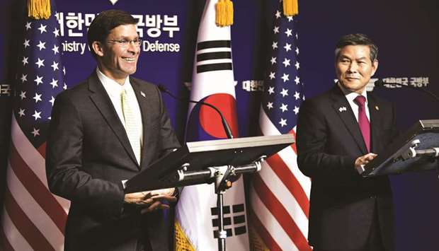 US Defence Secretary Mark Esper (left) and South Korean Defence Minister Jeong Kyeong-doo hold a joint press conference after the 51st Security Consultative Meeting (SCM) at the Defence Ministry in Seoul yesterday.
