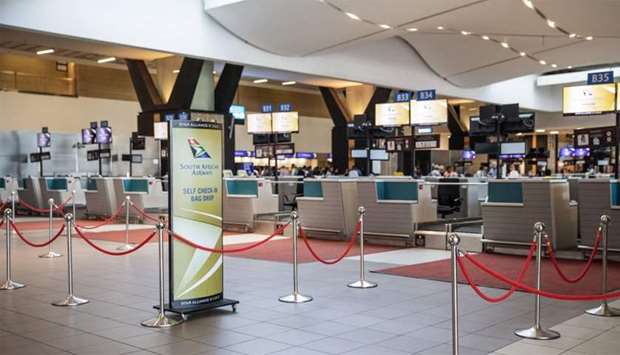 Empty SAA (South African Airways) check-in counters are seen at the O.R. Tambo International Airport in Johannesburg, South Africa