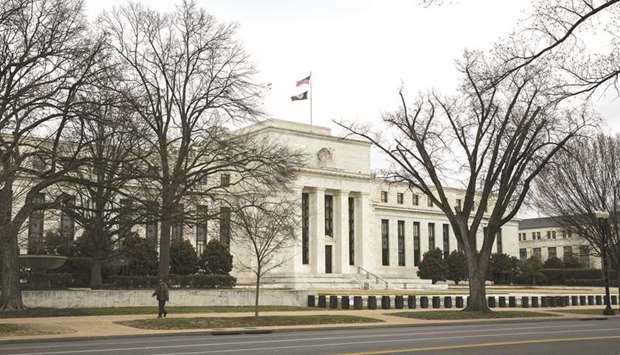 The US Federal Reserve building in Washington, DC. The latest version of the central banku2019s twice-yearly report,  released on Friday, meant to flag stability threats on the Fedu2019s radar, highlighted the rate squeeze facing banks and insurers, noting that it could erode lending standards.