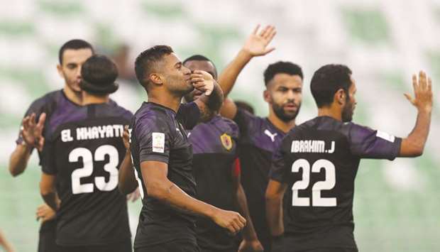 Qatar Sports Clubu2019s Kayke Rodriguez  (C) celebrating his hat-trick against Al Gharafa.