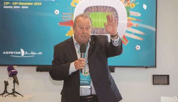 Chairman of the FIFA Medical Committee, Dr Michel Du2019Hooghe, speaks during the football doctorsu2019 workshop. At right, doctors attending the workshop.