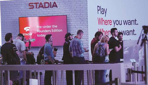 Attendees visit the Stadia cloud streaming gaming service area on the Google exhibition stand at the Gamescom gaming industry event in Cologne, Germany, on August 20. The internet giant hopes to break into the global video game industry expected to top $150bn this year with cloud technology.