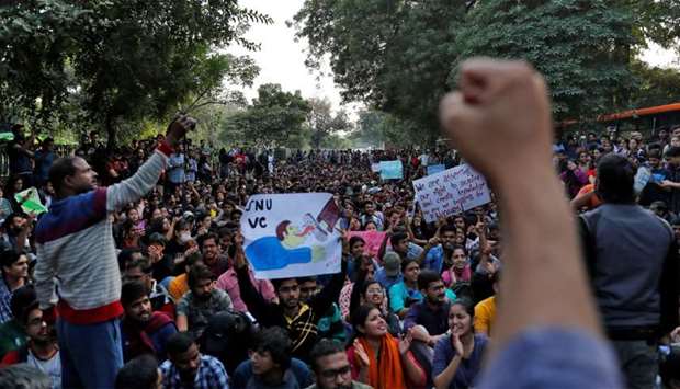 Students of Jawaharlal Nehru University shout slogans during a protest against a proposed fee hike, in New Delhi