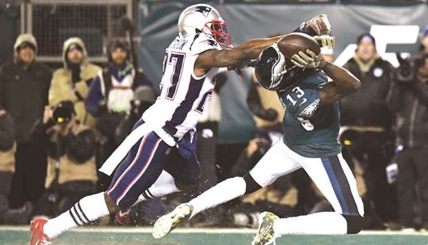 Philadelphia Eagles wide receiver Nelson Agholor (right) is unable to make the catch as New England Patriots cornerback J C Jackson defends during the fourth quarter at Lincoln Financial Field. PICTURE: USA TODAY Sports