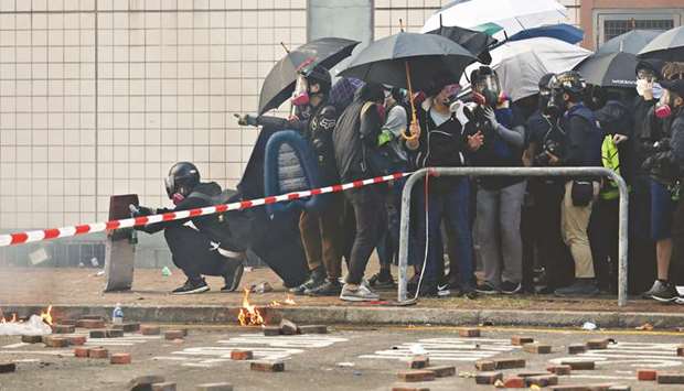 Protesters clash with police at the Hong Kong Polytechnic University (PolyU) in Hong Kong.