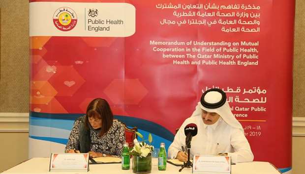 MoPH Director of Public Health Department Sheikh Dr Mohammed bin Hamad Al Thani and M Duncan Salbie cpo and  PHE Deputy Director Dr. Jenifer Smith sign the MoU