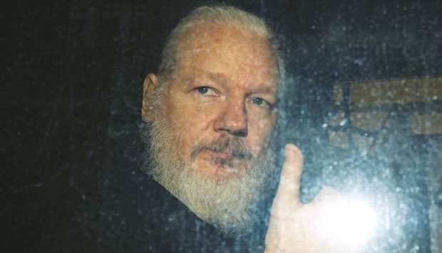 This picture taken in April shows Assange leaving a police station in London.